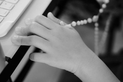 Close-up of hand holding hands