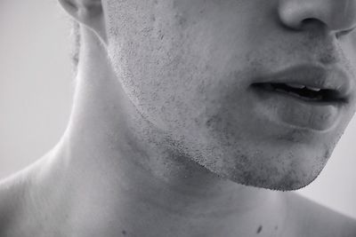 Midsection of man with stubble face