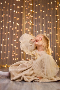 Portrait of young woman with bouquet