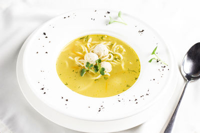 High angle view of soup served on table