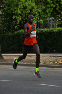 Full length of man running