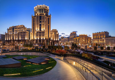 Illuminated buildings in city