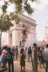 Group of people in front of historical building