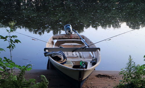 View of boat moored at lake