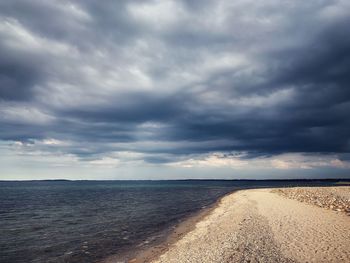 Scenic view of beach against sky