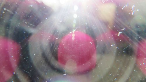 Full frame shot of pink umbrella against sky