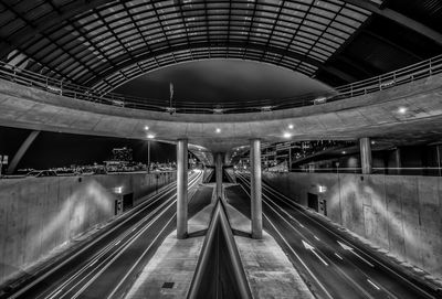 Illuminated bridge at night