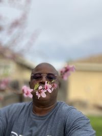 Portrait of man standing outdoors