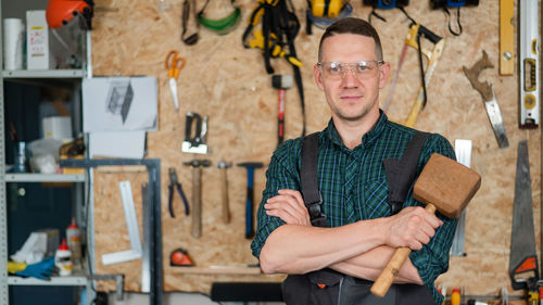 Portrait of man working in workshop