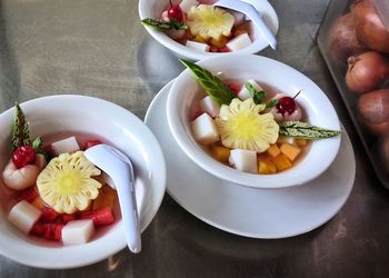 High angle view of fruits in bowl on table