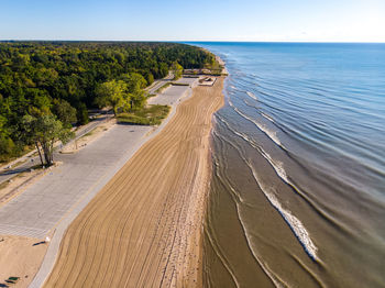 Scenic view of beach against clear sky