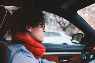 Portrait of boy in car