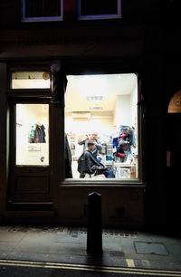 People at entrance of building