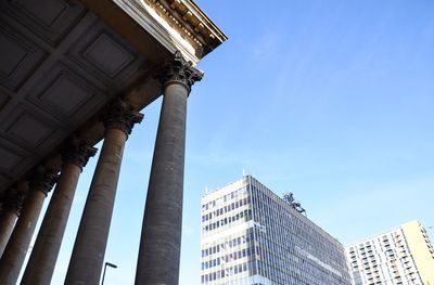 Low angle view of city against sky