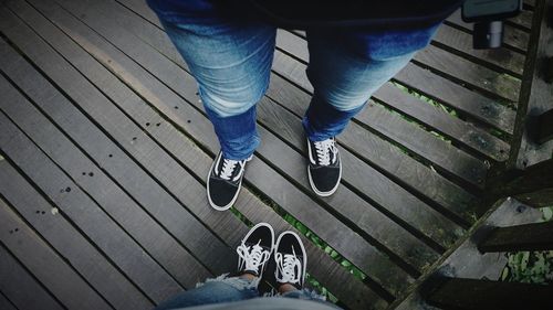 Low section of people standing on staircase