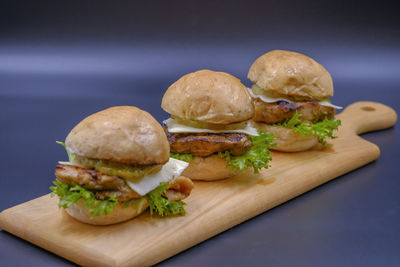 Close-up of burger on cutting board