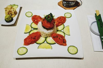 High angle view of salad served on table