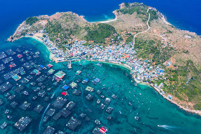 High angle view of bay with city in background