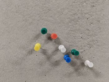 High angle view of balloons on sand