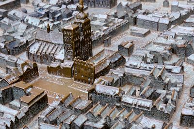 Top view of city model with historical cityhouse in metal .