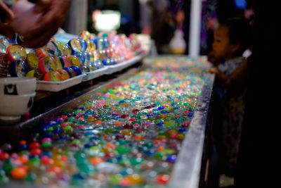 Close-up of colorful shop for sale