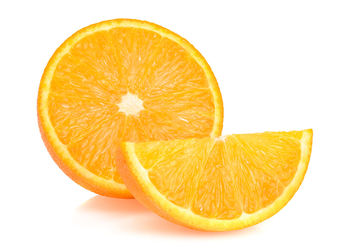 Close-up of orange slice against white background