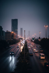 Traffic on city street at night