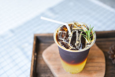 High angle view of drink in glass on table