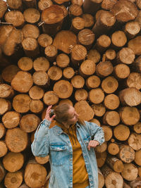 Stack of logs in forest