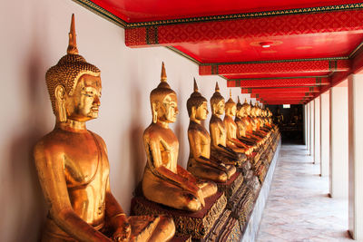 Buddha statues in row at temple