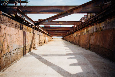 Narrow walkway along walls