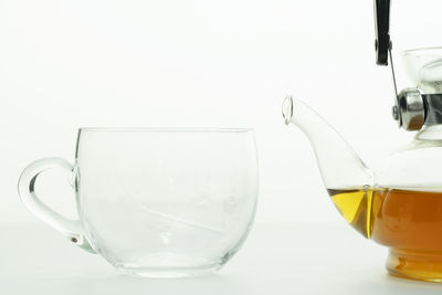 Close-up of coffee cup against white background