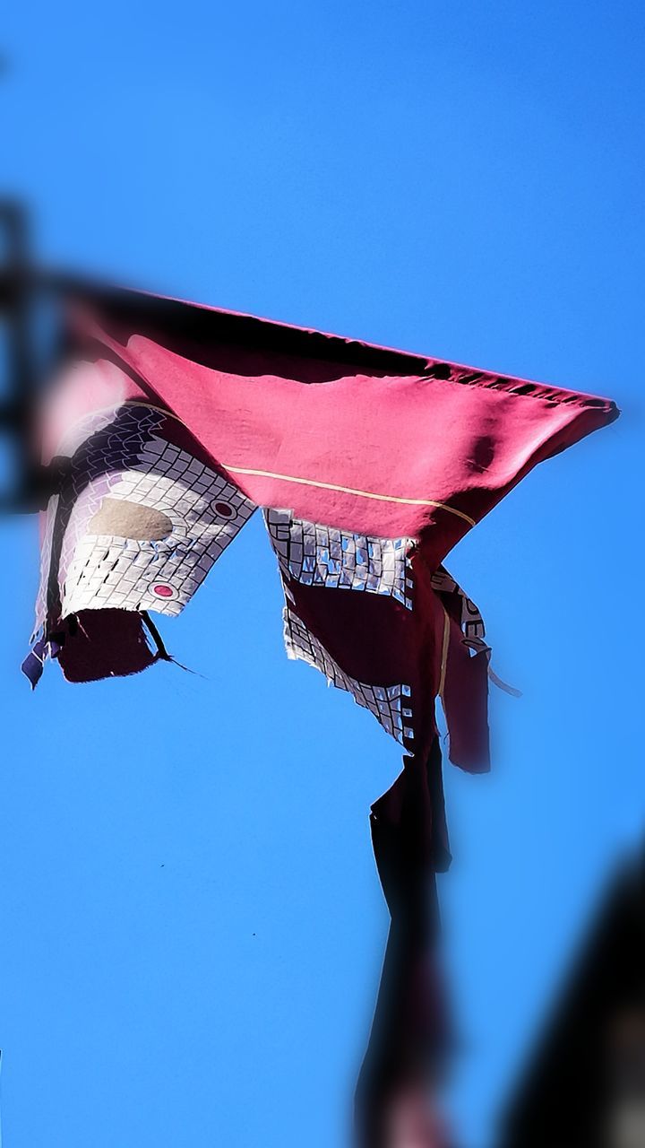 blue, clear sky, low angle view, hanging, day, outdoors, no people, sky