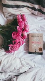 Close-up of flower bouquet on bed