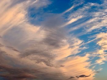 Low angle view of dramatic sky during sunset