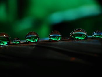 Close-up of sunglasses on glass