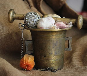 Food with mortar and pestle on burlap