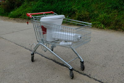 Shopping cart in grass