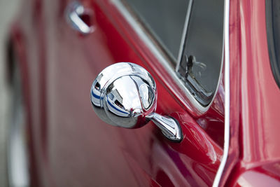 Side-view mirror of vintage car