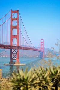 Golden gate bridge against blue sky