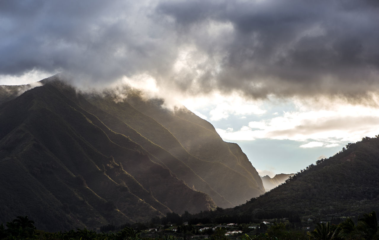mountain, mountain range, scenics, tranquil scene, sky, beauty in nature, tranquility, cloud - sky, landscape, nature, physical geography, weather, cloudy, idyllic, non-urban scene, majestic, mountain peak, cloud, snowcapped mountain, remote
