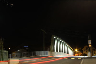 Light trails on road at night