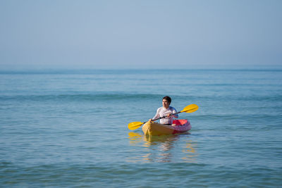 man paddling a