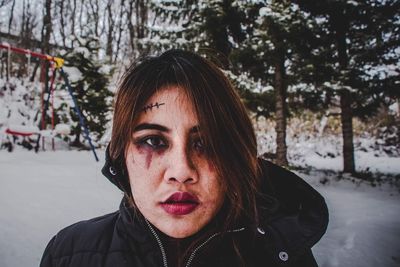 Portrait of young woman in winter