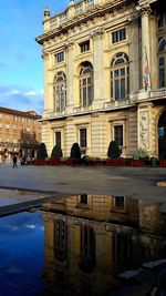 Reflection of building in water