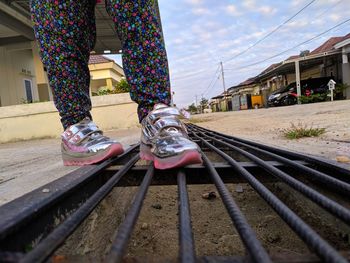 Low section of person on railroad track