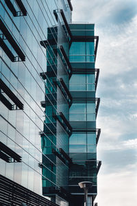 Low angle view of modern building against sky