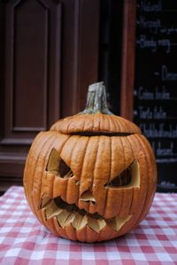 Close-up of jack o lantern on table