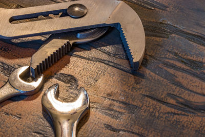 Directly above shot of work tools on wooden table