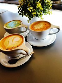 Close-up of cappuccino on table